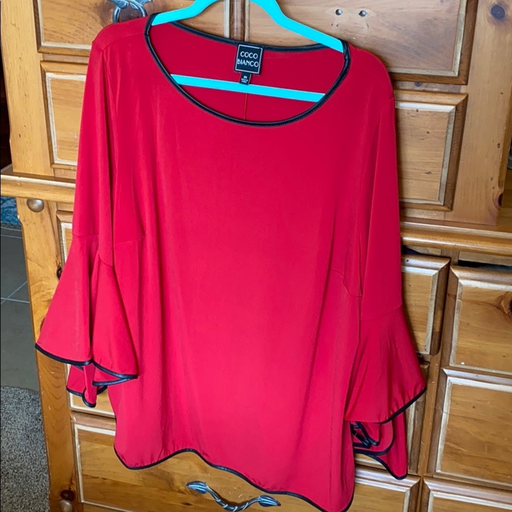 Red with black trim, flared arm, blouse